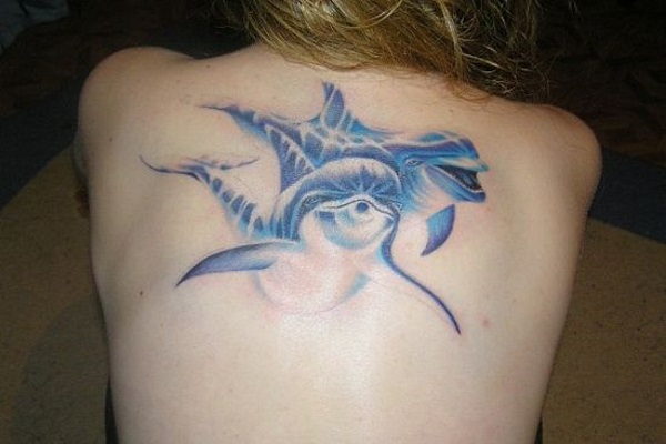 Значение татуировки дельфин